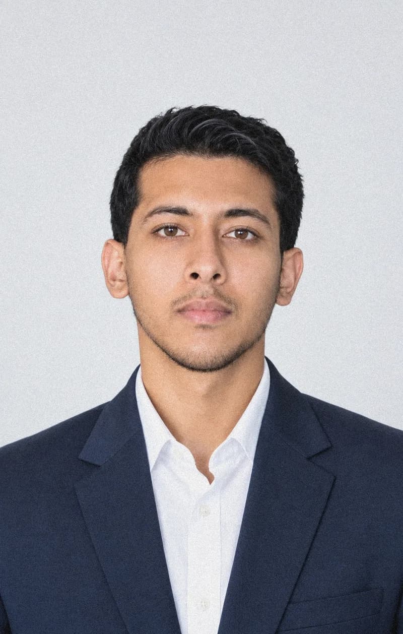 Portrait of Sufian Pranto in a navy blazer and white shirt